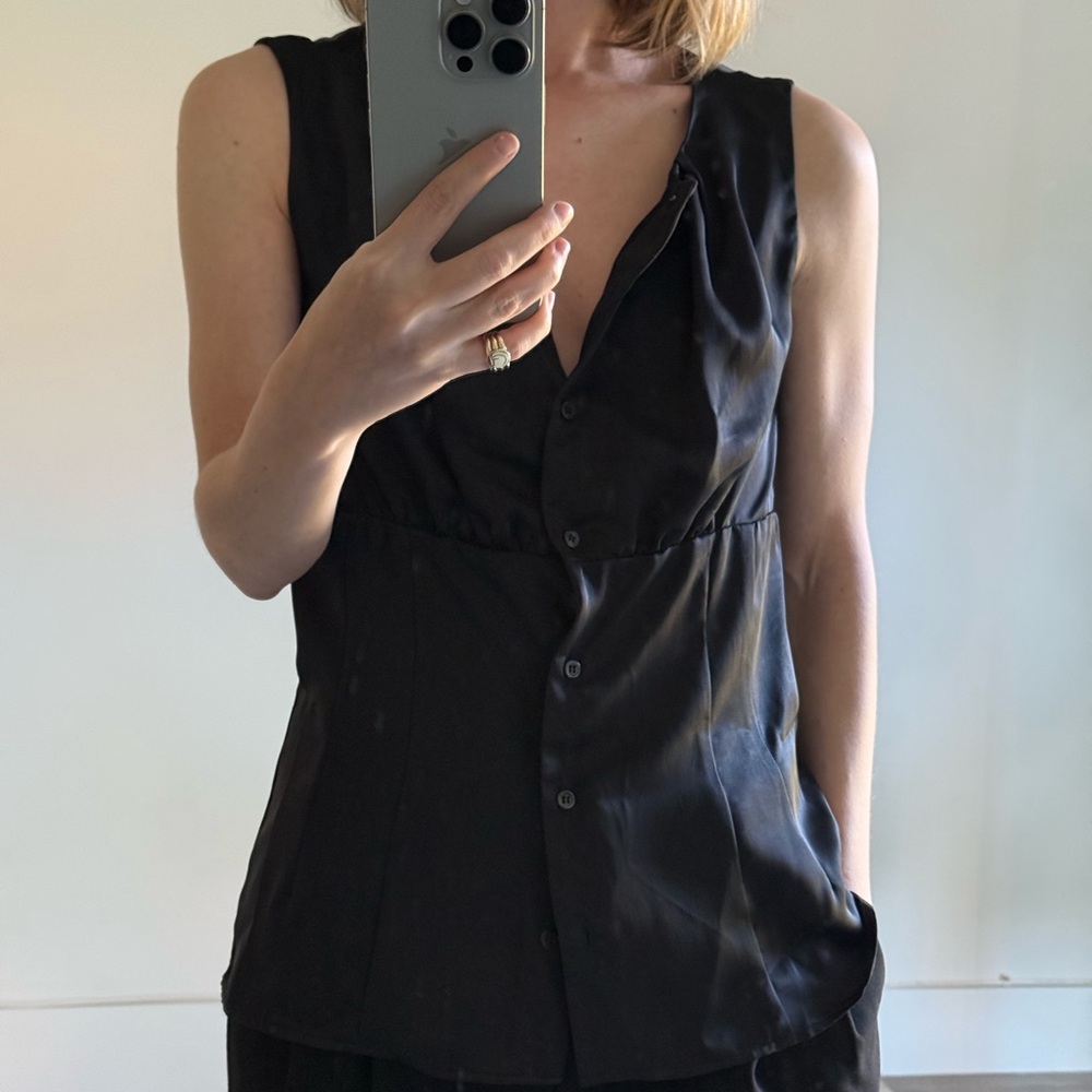 Beautiful Prada sleeveless blouse, size 42.  Silk material.